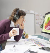 logo designer working computer desktop
